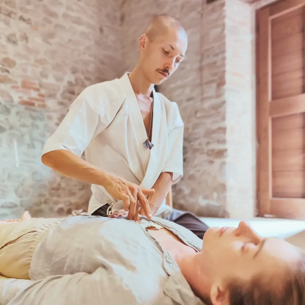 Francesco giving a Shiatsu Session